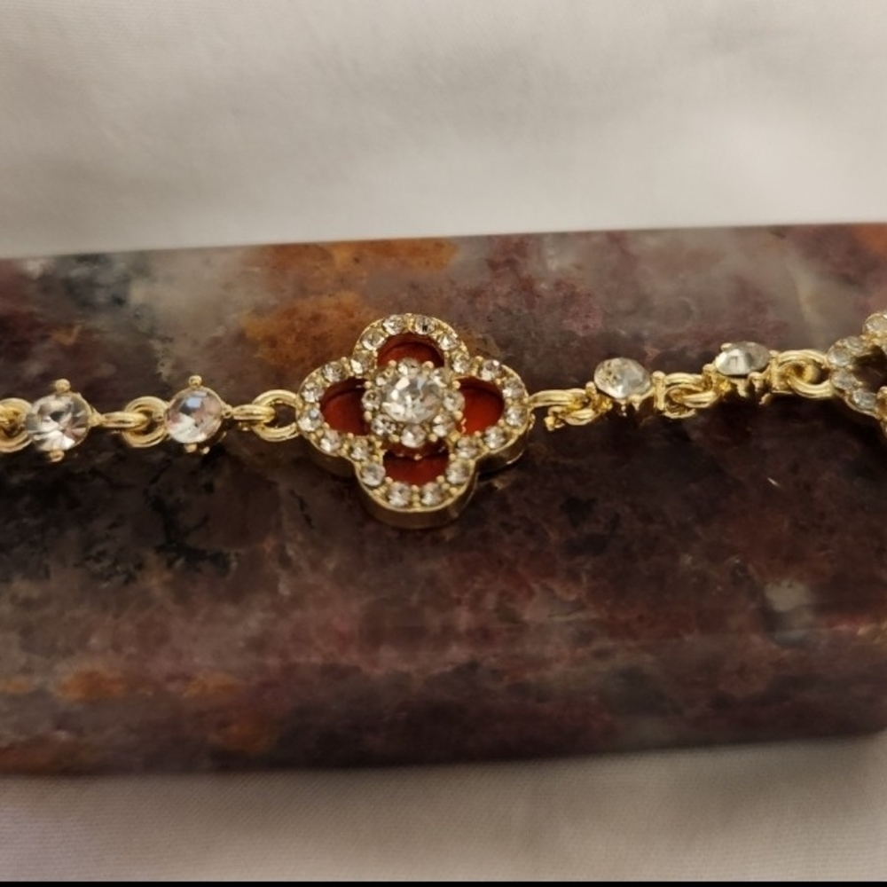 Elegant Gold and Red Iced Clover Bracelet